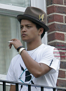  Bruno is 26 years old. Yesterday on 8. October was his birthday! and i think that he smokes, at least i have seen a lot of pics where he smokes.... but why should it ruin his perfect smile, nothing can ruin it, it is his nature that he is perfect!!! :))