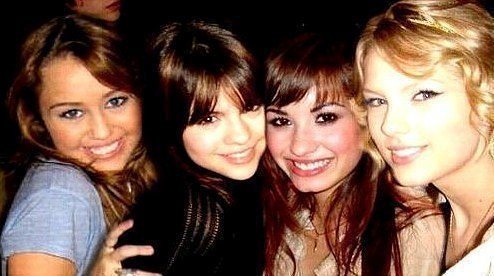 selena and demi with taylor and miley