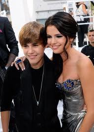  This is Selena Gomez and Justin Bieber at the VMA's in 2011.Together they make such a cute couple.(I think they do)