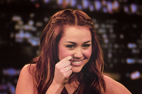 I Like Both OF Them...But I love Miley More!!!!!