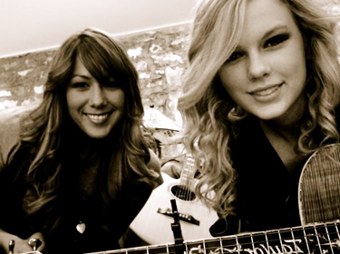 Taylor with Colbie Callait. I think this is a cute pic <13