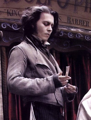  Well, um... Once I had this dream about 'Sweeney Depp'. :D Johnny as Sweeney Todd. His hair in that movie really turns me on because I have a dark-wavy hair fetish (not kidding). x_x So yeah, in my dream, I went to Londres with an Indiana Jones type of dude to find Sweeney. And we were looking for clues at a river (Thames?). Later we found an old wooden house, then we ran into some kind of indian tribe in a forest... Don't ask. O_o; They killed my guide (the Indiana Jones guy) and I ran back to the wooden house and locked the door. It was really dark inside and when I turned around Sweeney came out from the shadows in his sexy clothes (like in the pic below). And I was sitting on a dusty wooden escrivaninha, mesa and he stood in front of me and kissed me many times and I was touching his hair with both of my hands, it was so soft and silky and we wanted to do mais but my freaking phone rang... I really wanted to break that damn thing! XD I turned my phone off and tried to fall asleep to dream the rest of it (sometimes I can do that), but it didn't work. :,( 95% of the time when I dream about Johnny, he's in my dreams as Sweeney, because the way he looks like in that movie is like the perfect guy for me, dark wavy hair and everything... xD But yeah, this was the most romantic dream... Romantic and unfinished. -_- I still remember what it felt like to touch his hair in my dream... *drools* Oh, that hair is going to kill me!