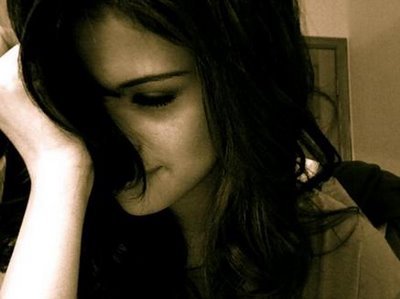 Selena looking down.. 
is she sleepy or blushing..?? :D