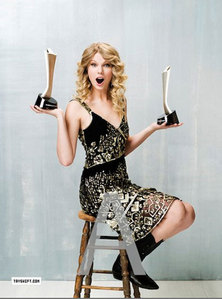  with her awards and kinda shocked<13