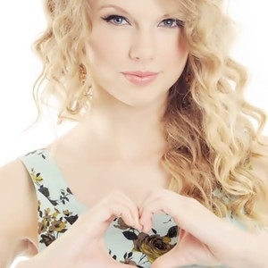 Hmm..well here's one of Taylor making a heart with her hands!^^