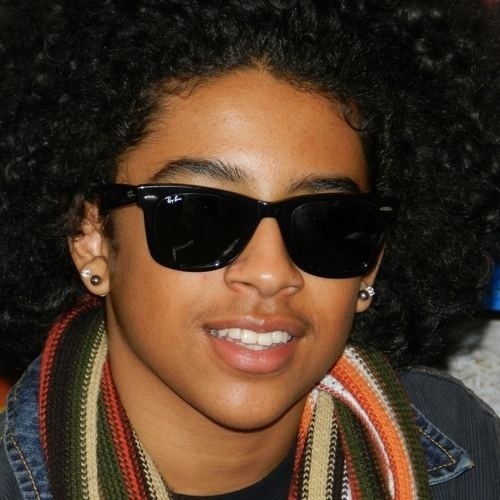  he not cute.....HE SEXY!and whoever think he not sexy then u dont know wat u missing out on.....=)see!?look at all that hair!!!lol
