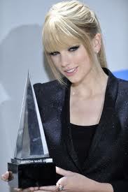 Is this O.K?  Change it?    Straight Hair,  Holding an award, At an award show , AND POSING!