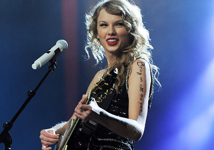 I love this picture because the twinkle in Taylor's eye. She's at her happiest when she is on stage performing. You can tell she truly loves what she does and she appreciates her fans so much. She always looks in awe when she's on stage. Like she's having the time of her life. Just one of the many things I love about Taylor <3
