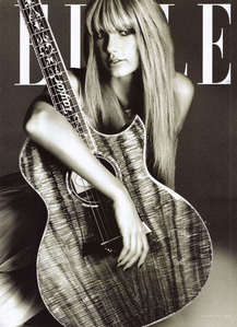 with a guitar and straight hair <13