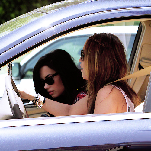 Miley Cyrus In A Car