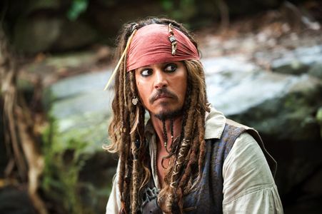  I really amor ALL his cine but I think that my favorito! is Pirates of the Caribbean!!! <3 i llove Captain Jack Sparrow and I think that this is his best role!!!