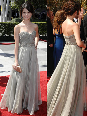 HERE <3 I FIND THE DRESS REALLY GORGEOUS AND SHE'S LOOKING GOOD WITH IT <3