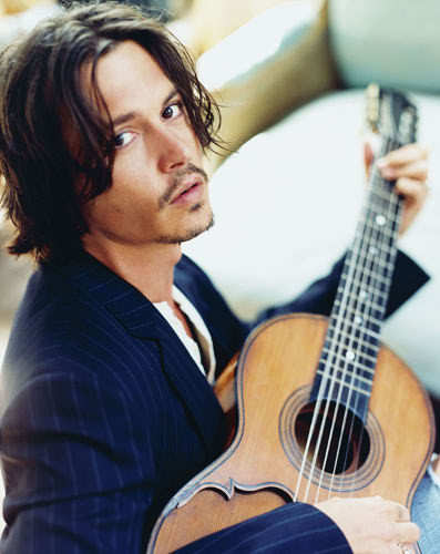  I'd dare him to let me play with him in one of his movies,and then I'd dare him to tought me how to play guitar.You imagine girls having such a hot,charming and beautiful violão, guitarra teacher,Johnny