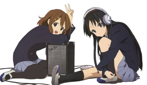 Probably Yui from K-ON! (the girl on the left in the pic. The girl on the right has my personality though xD)
My hair is a bit longer than hers though, like just a bit past my shoulders...

But I wear my hair out the same as her each day, with a side fringe across my face. I do the exact same thing with the 2 coloured hairclips everyday(on the same side too), and I also wear black tights to school everyday xD
My personality isn't like hers though, Mio's personality is like mine xD To be honest, Yui inspired my style a bit.. in fact, all the K-On girls did ;P