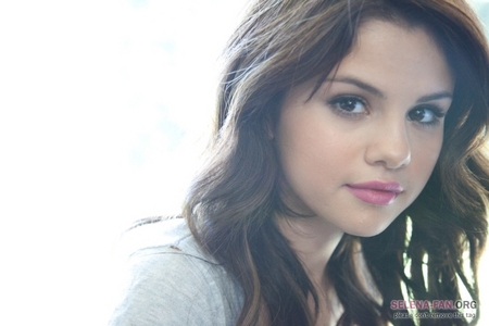 mine... here's my link: http://www.mosaicwallpapers.com/view-wallpaper/selena-gomez-close-up_640x960_1395