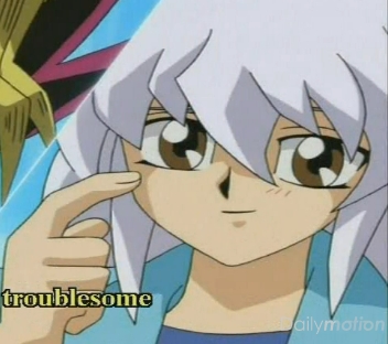  I could think of a number of characters but I'' go with Ryou Bakura-kun from Yu-Gi-Oh!