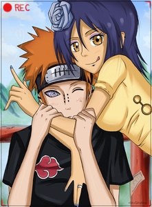 my favorite couple and my profile pic....and technically,konan IS hugging pein....i LOVE the awkward blush on his face....classic teenage boy,no matter HOW badass he is,thats why he's my favorite akatsuki member.....