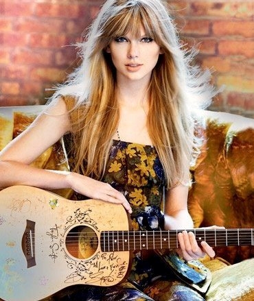 taylor with a guitar :)