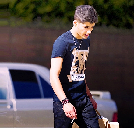I would stop smoking, because that's bad for Zayn, I want him to have a long healthy life. 