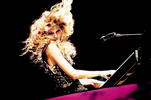 Here!
PLaying the piano!