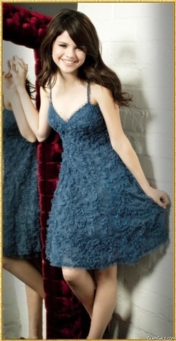  mine http://images5.fanpop.com/image/photos/27100000/Selena-Gomez-is-pretty-in-a-blue-dress-zanzoonfan-27113314-500-422.jpg