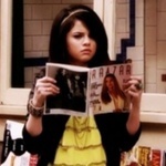 Post A Pic Of Selena Reading Magazine**...Props...** 