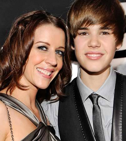 What is Justin Bieber's biological mother name?