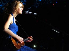 Post a pic of Taylor Swift playing a ukulele! P.R.O.P.S. :)