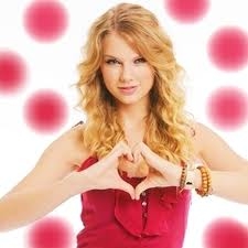 post a pic of Taylor doing her signature heart <3
