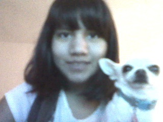  Tell me what wewe think of this pic of me and my puppy rat.XD
