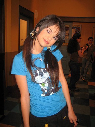 post a picture of selena in the first season of wizards of waverly place it can be on set or off set winner gets 10 props 