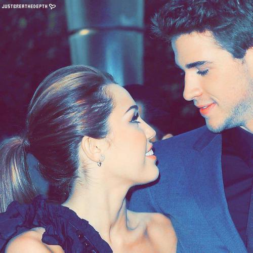  post a cute pic of miley with liam