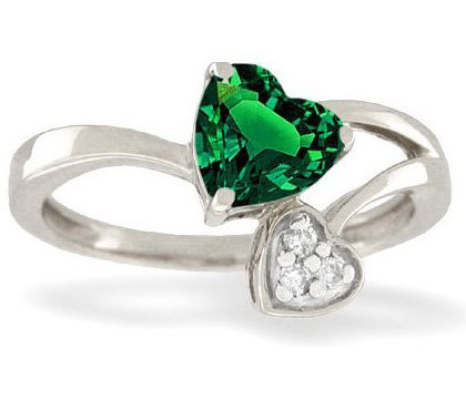 The ring he got Aislinn. (This was the only one I could find with two hearts. Imagine the green сердце being red instead.)