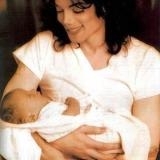 Michael holding Little Wendy (I know its him holding Prince, but pretend it's Wendy he's holding)