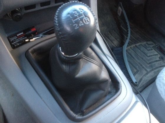  The gearshift in my truck, and ice-scraper laying on the passenger floorboards! XD