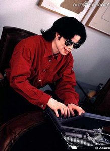  Michael at his computer and on twitter
