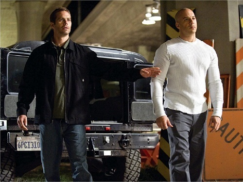  Paul Walker as Brian O'Conner and Vin Diesel as Dom Toretto