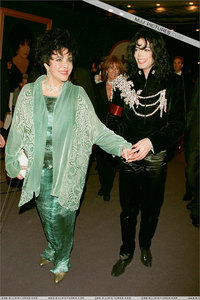 Taken at Dame Elizabeth Taylor's star-studded "65th" birthday gala,on February 16, 1997, and Michael 