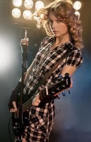  Here! she has a guitar!!! :)