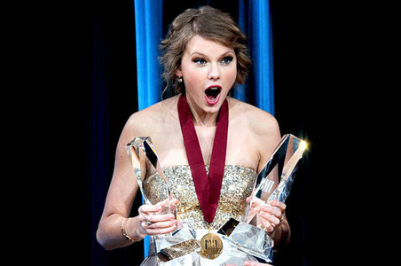 mine
i guess she is too shocked as she got so many awards