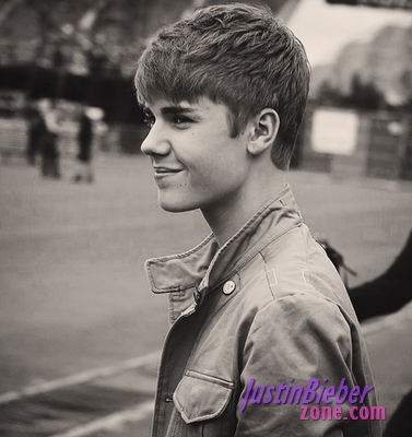  post a pic of justin bieber smiling or laughing...