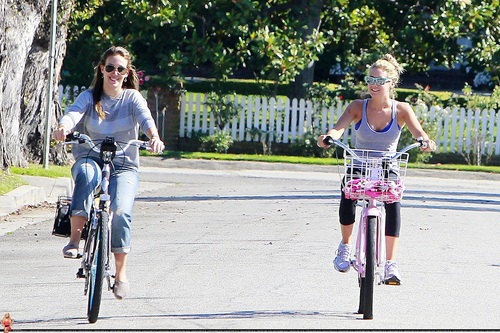 Ashley - Riding a bicycle with Haylie Duff - August 14, 2011