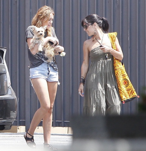  Miley - Strolling through a parking lot in Beverly Hills - August 12, 2011