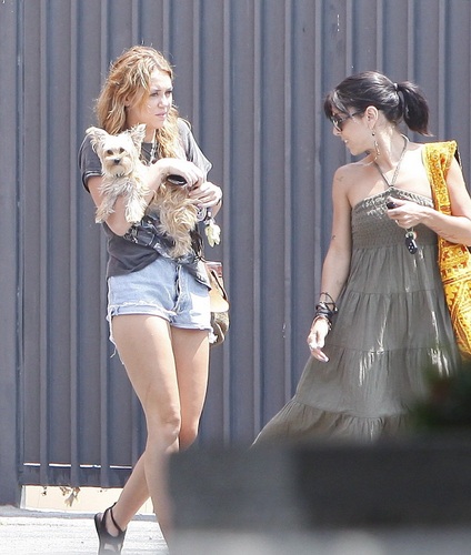  Miley - Strolling through a parking lot in Beverly Hills - August 12, 2011