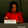 LOL MJ , I'm wondering what are you having in your hands  - michael-jackson photo