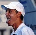 Tomas Berdych tongue - tennis photo