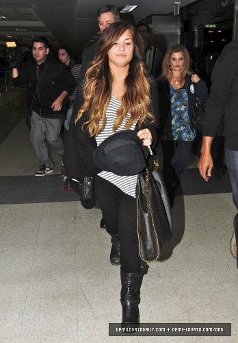  Demi - Departs from LAX Airport - September 15, 2011