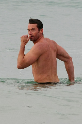 Hugh Jackman goes for a swim in the ocean