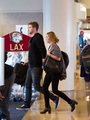 Miley - At LAX Airport with Liam, Tish & Billy Ray - September 27, 2011 - miley-cyrus photo