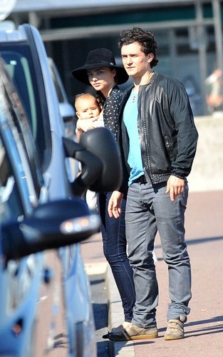Orlando Bloom with Miranda Kerr and baby Flynn at the airport in Paris, France (September 28).